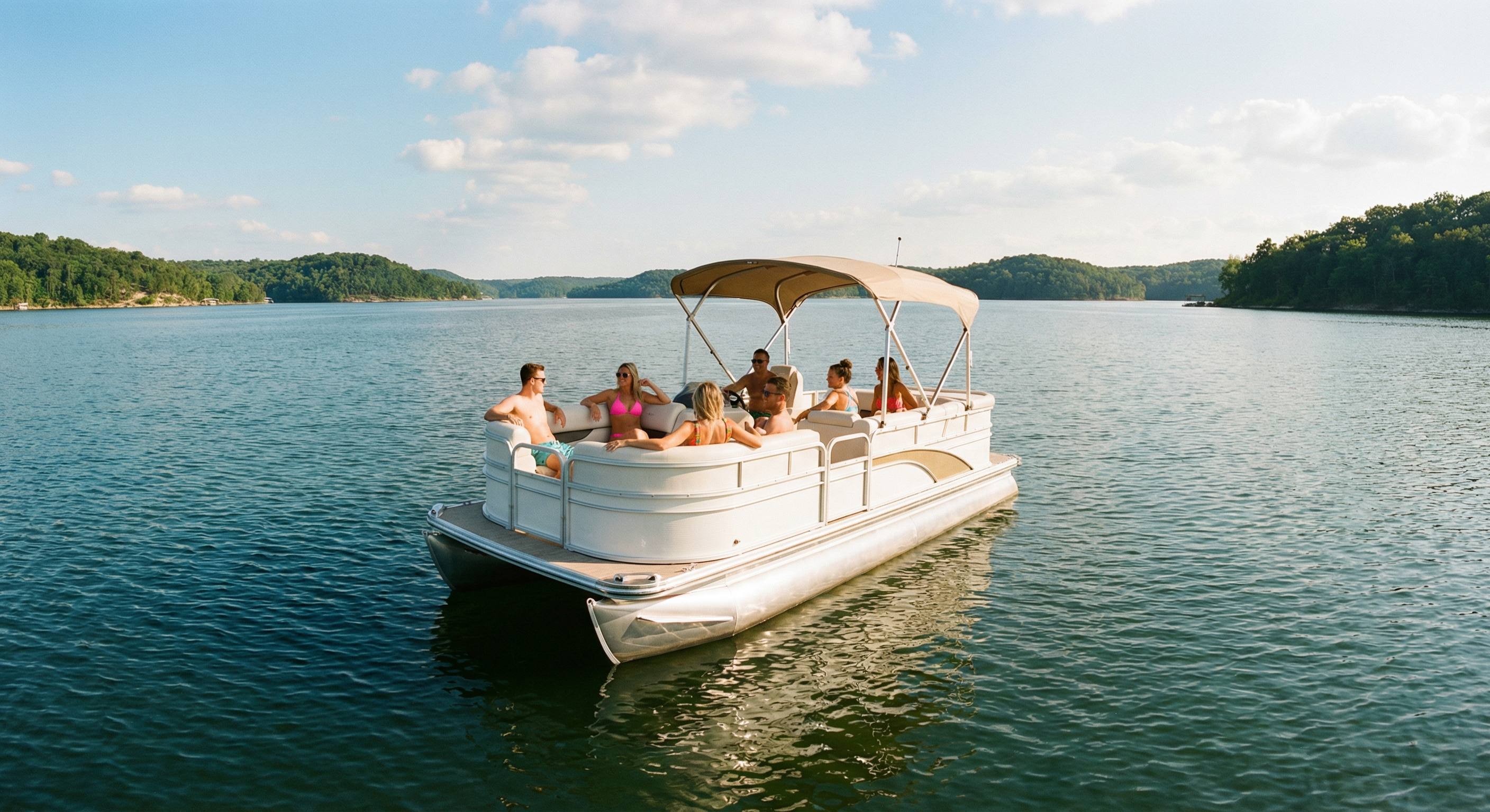 Pontoon boat on Lake of the Ozarks on a sunny day